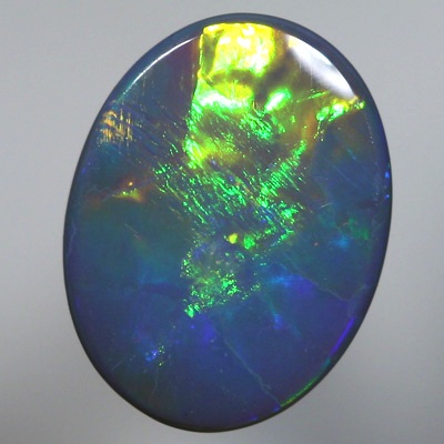 SOLID SEMI BLACK OPAL Large rolling flashes, neon orange to green